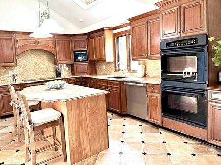 Barnstable Cape Cod vacation rental - Large hang out kitchen. Dual oven and induction stove