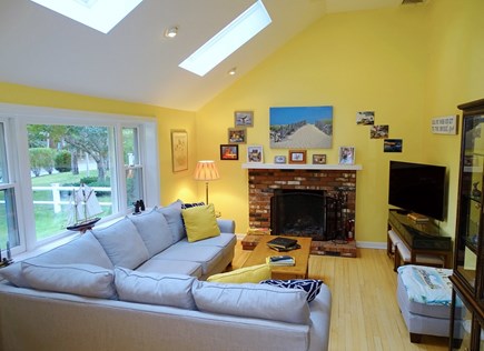 South Yarmouth Cape Cod vacation rental - Vaulted living room with skylights, wood floors