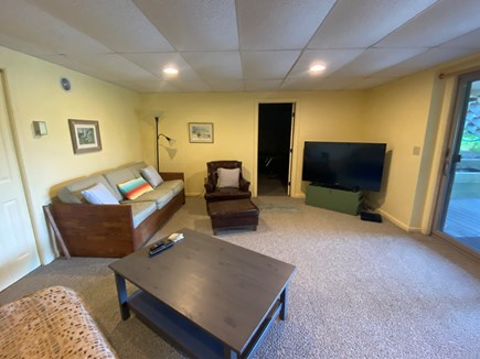 Eastham Cape Cod vacation rental - Basement hangout room. Door leads to ping pong room.