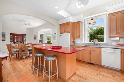 Dennis Cape Cod vacation rental - Kitchen with bar seating and views of dining