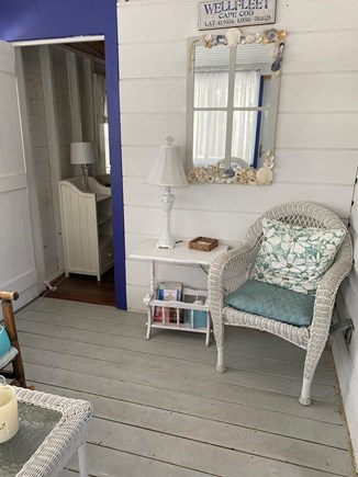 Wellfleet Cape Cod vacation rental - The porch includes large screened windows, encouraging breezes.