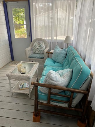 Wellfleet Cape Cod vacation rental - The porch's couch can be made into a single bed.