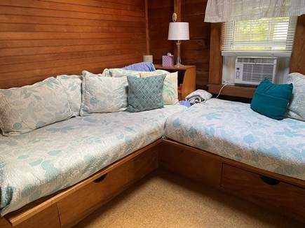 Wellfleet Cape Cod vacation rental - Living room couches serve as twin sleeping spaces.