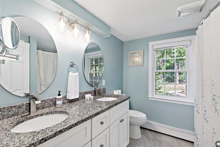 Mashpee Cape Cod vacation rental - Full bathroom with a double vanity,tub, and shower