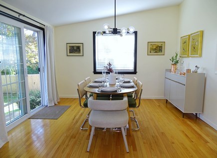 Yarmouth Cape Cod vacation rental - Sunny dining room seats 6 comfortably, slider to back yard 