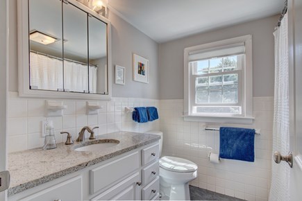 South Chatham Cape Cod vacation rental - Second-floor bathroom, with shower and tub.