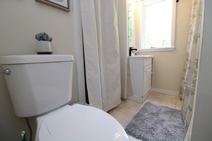 Dennis Cape Cod vacation rental - Full bath with tum and adjacent laundry room