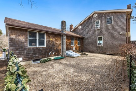 Falmouth Cape Cod vacation rental - Fenced dog yard on side of house. Doggie door from Bedroom 1.