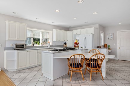 Eastham Cape Cod vacation rental - Bright white eat in kitchen