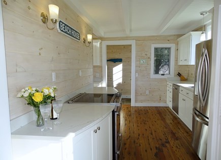 West Yarmouth Cape Cod vacation rental - Kitchen area, facing door to back yard 