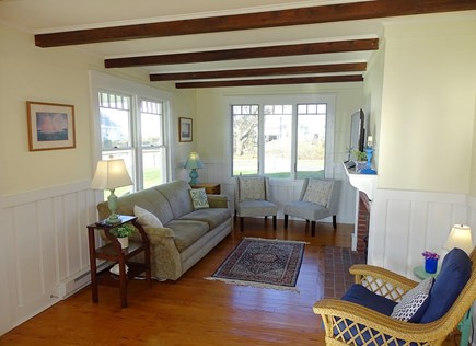 West Yarmouth Cape Cod vacation rental - Living room with water views, hardwood floors 