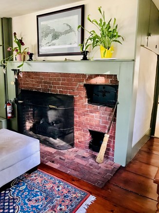 Brewster Cape Cod vacation rental - Original 1780s fireplace with bread oven, now elecric.