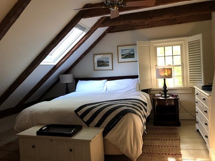 Brewster Cape Cod vacation rental - 2nd floor bedroom with King bed, skylight and historic details.