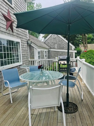 Brewster Cape Cod vacation rental - Porch extends off the sunroom for year round enjoyment.