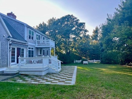 Brewster Cape Cod vacation rental - Spacious backyard with a deck