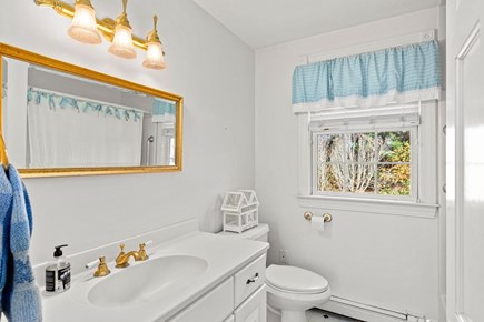 Brewster Cape Cod vacation rental - Primary full ensuite bathroom with a tub and shower