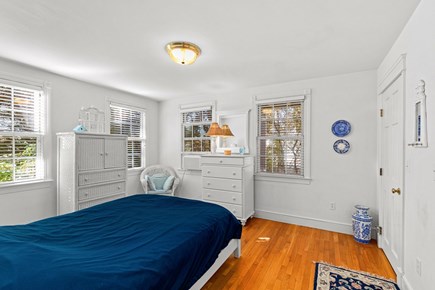 Brewster Cape Cod vacation rental - The primary bedroom on the first floor with a queen bed