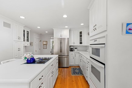 Brewster Cape Cod vacation rental - Bright white kitchen with a large stainless steel refrigerator