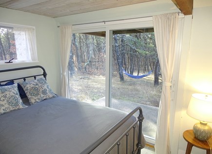 Wellfleet Cape Cod vacation rental - Downstairs full bedroom with slider to back yard