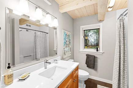 Mashpee Cape Cod vacation rental - Lower level bathroom with a tub and shower