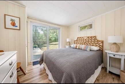 Truro Cape Cod vacation rental - Bedroom #1 with queen bed, dresser, small closet. Slider to back