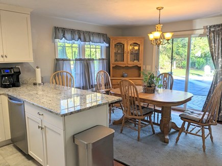 Dennis Cape Cod vacation rental - Open to dining table and sliders to pool area