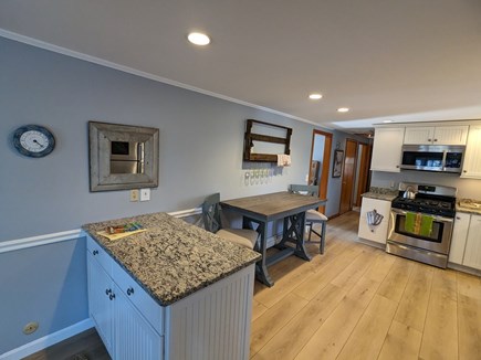 Dennis Cape Cod vacation rental - Eat in kitchen with nice new high top table and chairs