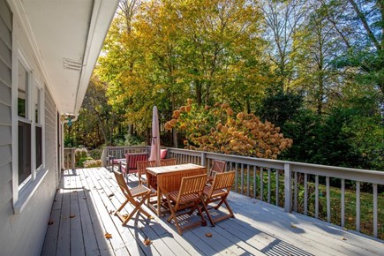 Falmouth Cape Cod vacation rental - Sprawling back deck with outdoor dining