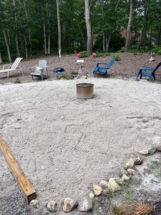 Dennis Cape Cod vacation rental - Beach sand with chairs and solo Fire stove