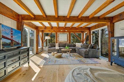 The Brewster Salt House Cape Cod vacation rental - Large living room with sliders to patio