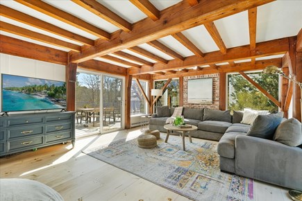 The Brewster Salt House Cape Cod vacation rental - Large living room with sliders to patio