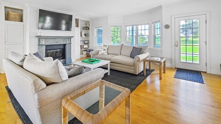 Eastham Cape Cod vacation rental - Living room with comfortable seating, TV and fireplace