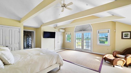 Eastham Cape Cod vacation rental - 2nd flr primary bedroom w/king bed, ensuite bathroom & balcony