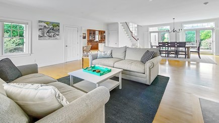 Eastham Cape Cod vacation rental - Living room with dining area beyond