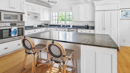 Eastham Cape Cod vacation rental - Kitchen has center island with counter seating