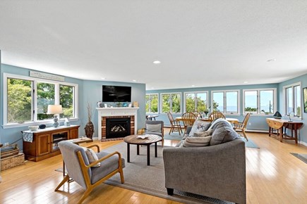 Eastham Cape Cod vacation rental - Gas Fireplace in open concept living area with bay views!