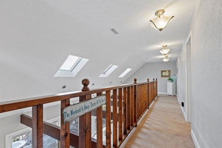 Yarmouth Cape Cod vacation rental - Upstairs walkway leading to bedrooms overlooks the living room