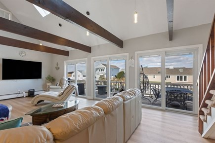 Yarmouth Cape Cod vacation rental - A wall of sliding glass doors opening up to the back deck