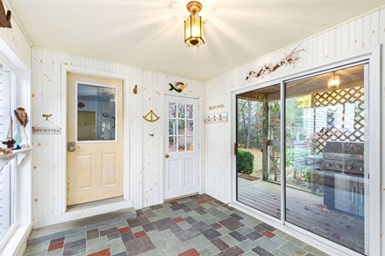 Brewster Cape Cod vacation rental - Breezeway connecting the house to the garage and back deck