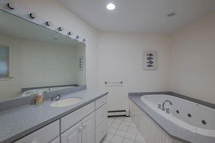 Wellfleet Cape Cod vacation rental - Primary bedroom's ensuite bathroom, complete with jacuzzi tub!