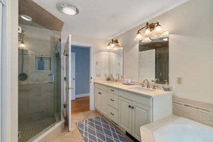 Osterville Cape Cod vacation rental - Ensuite bathroom located on primary floor with shower & Jacuzzi