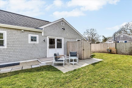 South Yarmouth Cape Cod vacation rental - #8 outside shower and master bedroom patio/yard