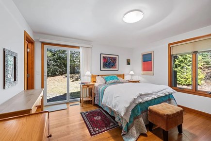 HarwichPort Cape Cod vacation rental - First Floor Master Bedroom with private exit to garden and patio