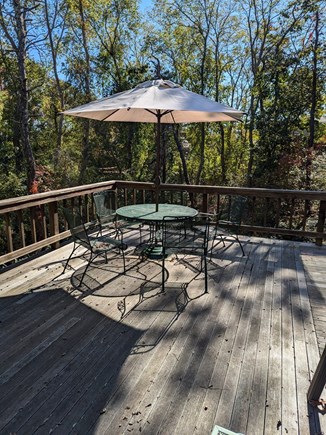 Wellfleet Cape Cod vacation rental - Deck with table and chairs, extends along 2 sides of the house