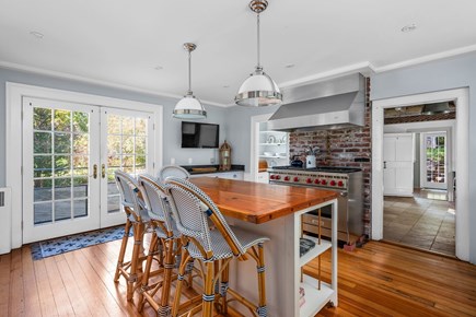 Barnstable Village Cape Cod vacation rental - Updated kitchen with access to deck and laundry/mudroom area