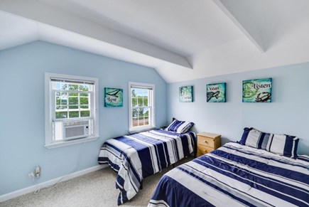 Harwich — on Long Pond Cape Cod vacation rental - Bedroom with 2 twin beds and sunrise views over Long Pond.