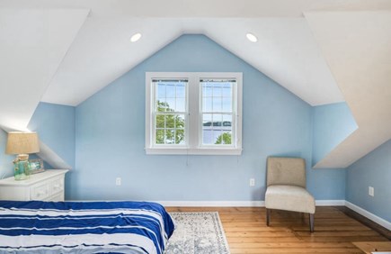 Harwich — on Long Pond Cape Cod vacation rental - Bedroom with sunrise views of our private beach over Long Pond