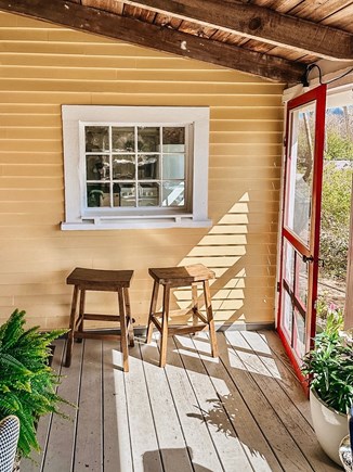 Dennis Village Cape Cod vacation rental - Enjoy the outdoors, mosquito-free, in the cozy screened-in porch.