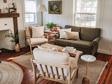 Dennis Village Cape Cod vacation rental - Living room with cathedral ceilings and original fireplace.