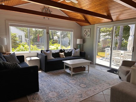 West Dennis Cape Cod vacation rental - Sun filled Living Room with slider out to back deck